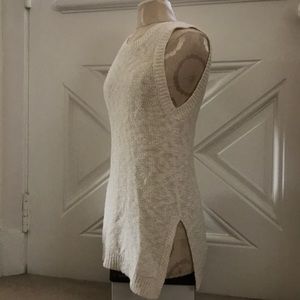 Long off-white knit sweater sleeveless